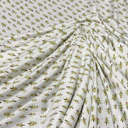 Cotton rib knit featuring a small formal print of Christmas trees