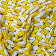 yellow and white zig zag crochet fabric 