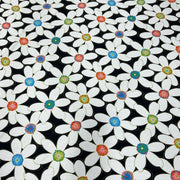 Cotton jersey fabric with a large format floral print on black background