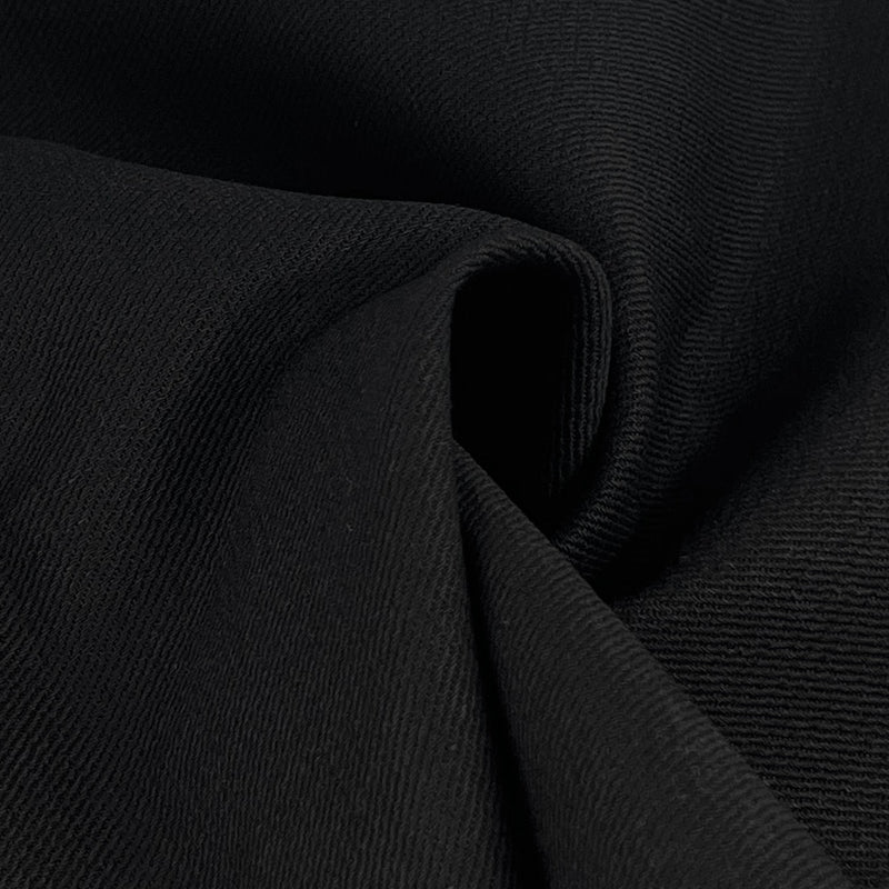 Close-up of black stretch denim fabric
