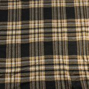 Close-up of black and beige plaid fabric