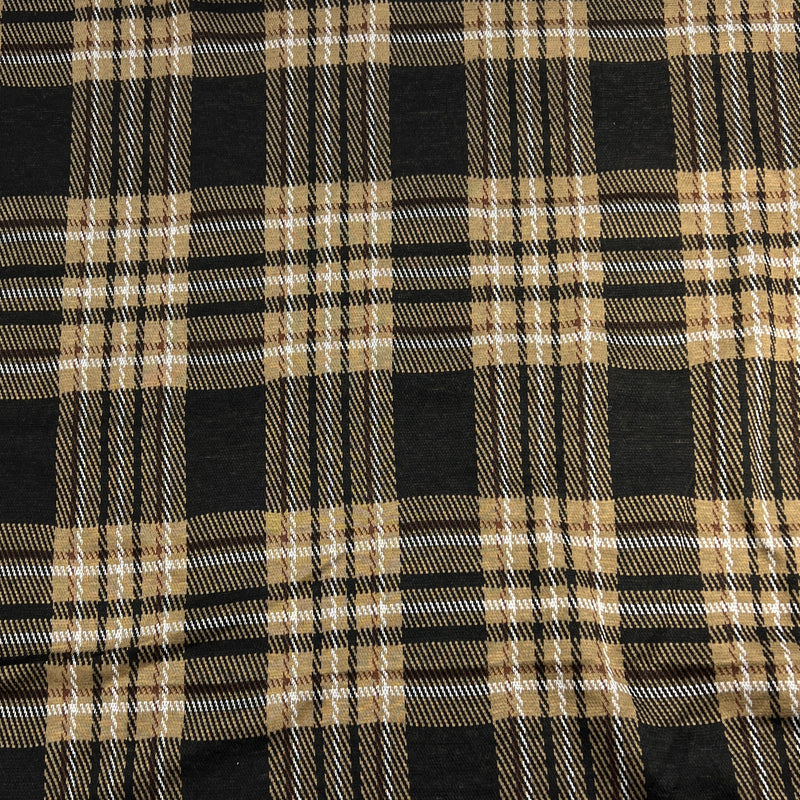 Close-up of black and beige plaid fabric