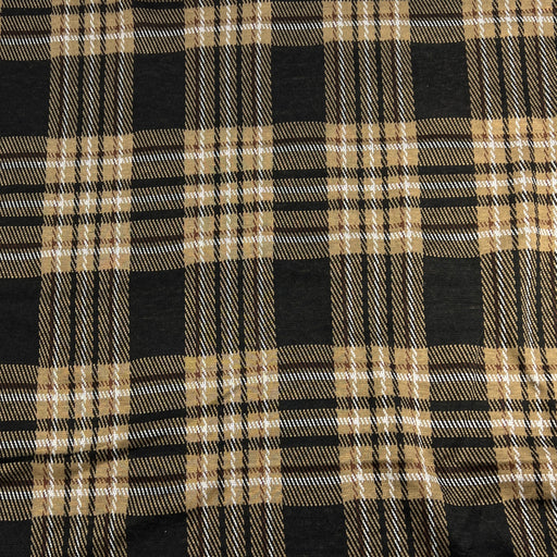 Close-up of black and beige plaid fabric