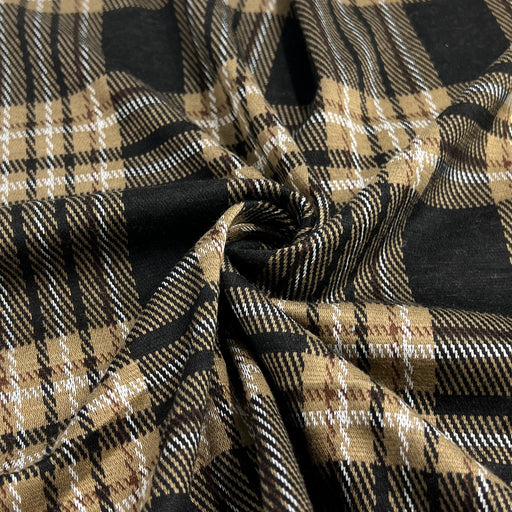 Plaid fabric with black, beige, and white pattern