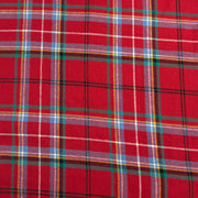 Close-up of red plaid fabric with a pattern of intersecting lines forming a classic "Crawford" Plaid design.