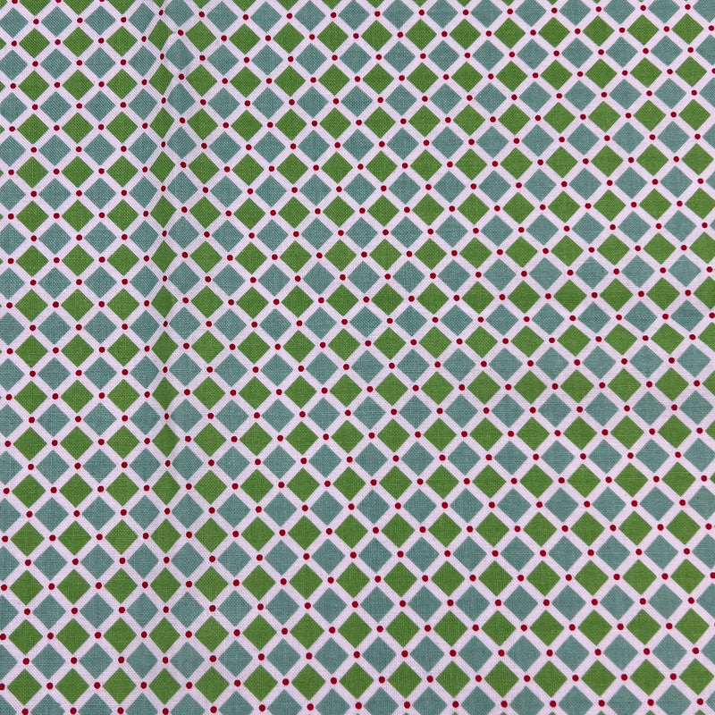 Patterned fabric with green and blue diamond shapes