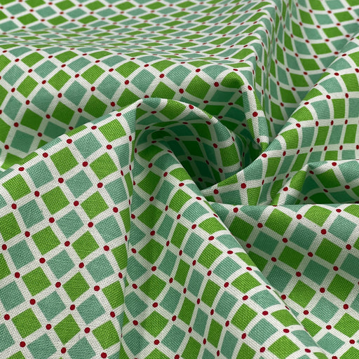 Green and white checkered fabric with red dots