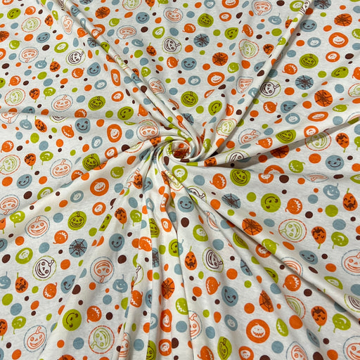 Cotton rib knit featuring a quaint pattern of Halloween motifs such as Jack o'Lanterns and skulls