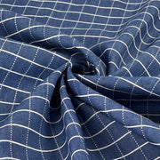 Close-up of blue fabric with white stripes