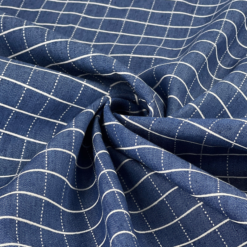 Close-up of blue fabric with white stripes