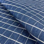Close-up of blue lightweight denim with white stripes
