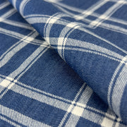 Close-up of blue and white plaid shirting weight denim chambray