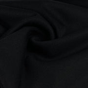Close-up of black fabric with a textured pattern