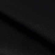 Closeup of black polyester and spandex rib knit fabric sold by the yard