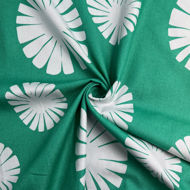 Green fabric with white floral patterns