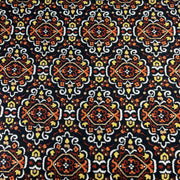 Patterned fabric with intricate design on a black background
