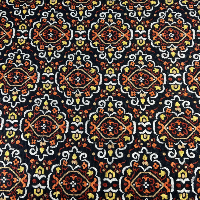 Patterned fabric with intricate design on a black background