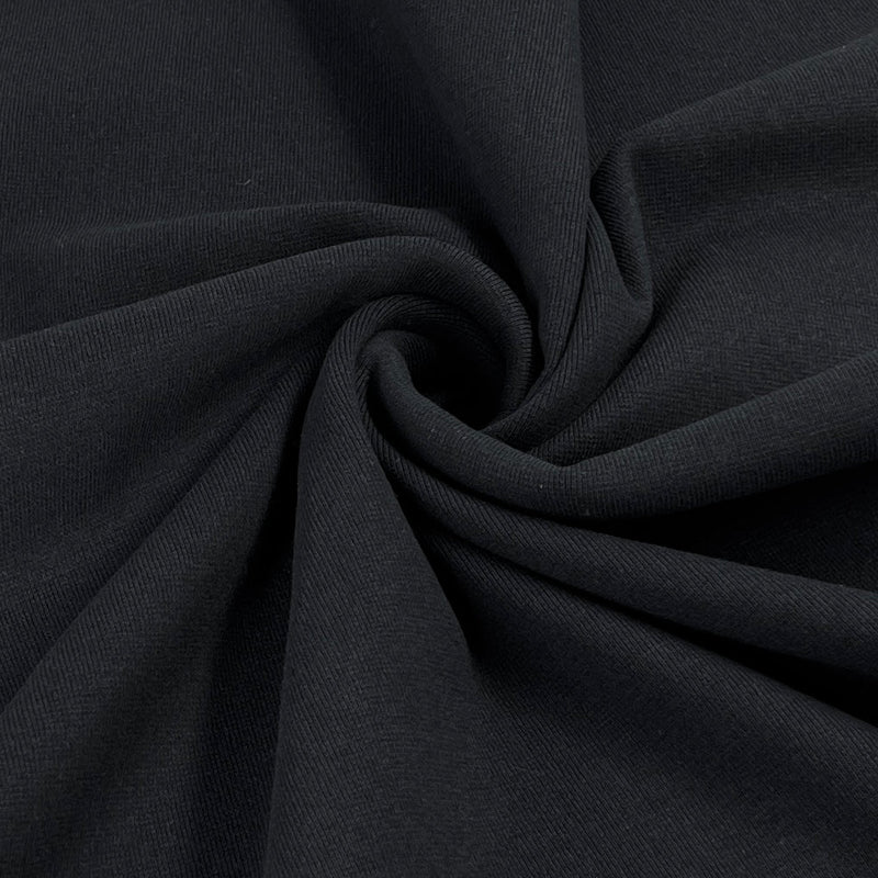 Close-up of black fabric with folds
