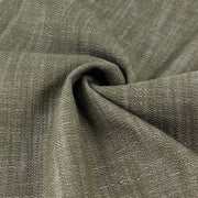 Closeup of earthy olive green super stretchy denim