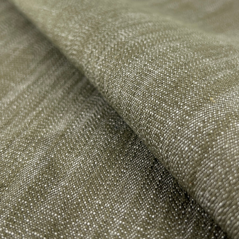 Closeup of olive green yarn-dye stretch denim