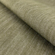 Closeup of olive green stretch denim with high spandex content