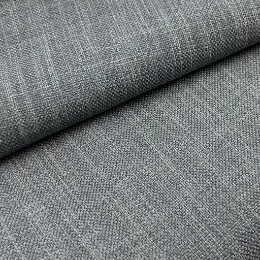 Close-up of gray fabric with a subtle pattern