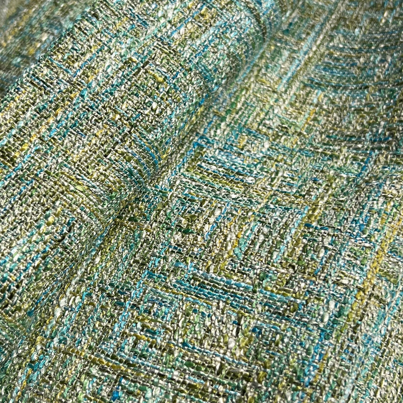 Green blue and yellow loose slub woven home decor fabric. 