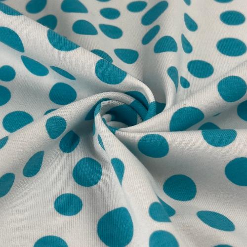 White Jersey Fabric With Scattered Turqoise Dots | Fun print for children's clothing sold by the yard