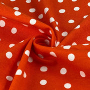 Vibrant Orange and White Polka Dots Printed Jersey Fabric for clothing - cotton/spandex blend