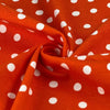 Vibrant Orange and White Polka Dots Printed Jersey Fabric for clothing - cotton/spandex blend