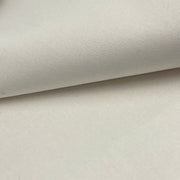 Closeup of a polyester/cotton broadcloth fabric in a stark white color
