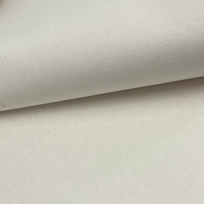 Closeup of a polyester/cotton broadcloth fabric in a stark white color