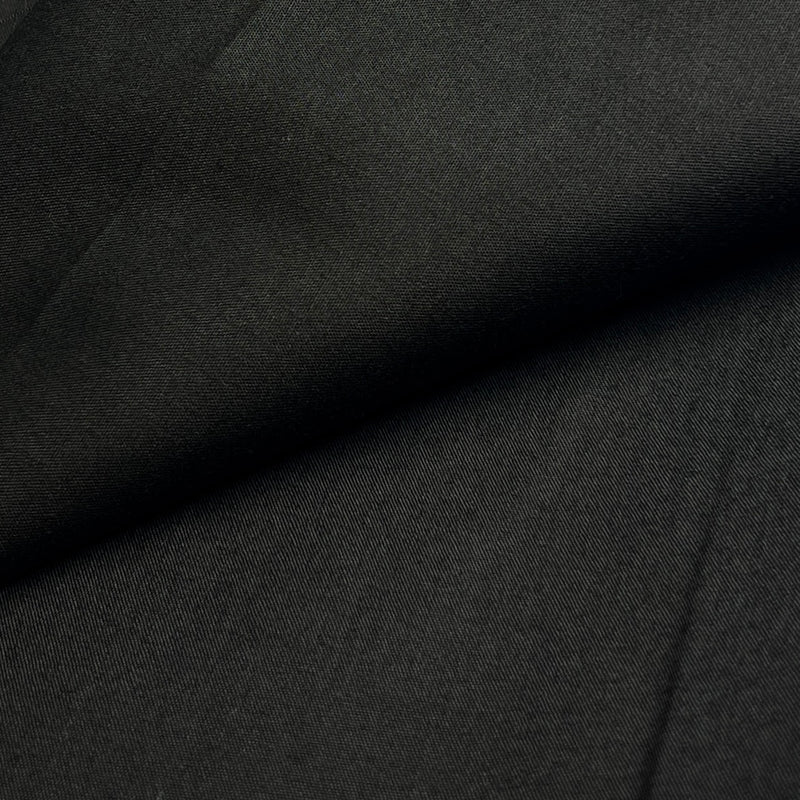 Close-up of dark gray fabric with a subtle texture