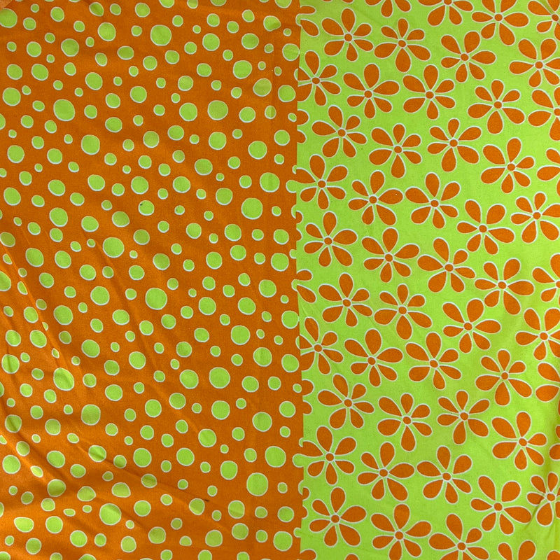 Two patterns side by side on a green background: polka dots and floral shapes.