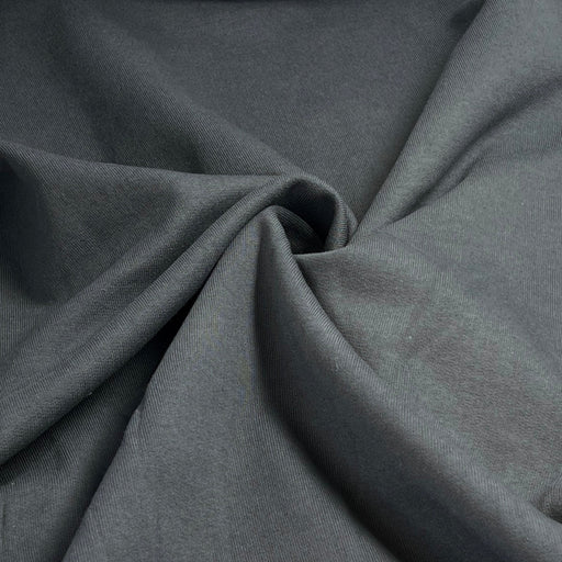 Close-up of dark gray fabric with folds
