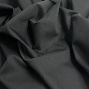Close-up of dark gray fabric with folds