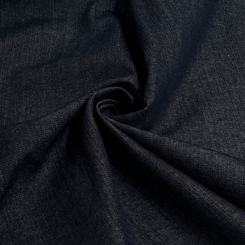 Dark navy blue fabric with a textured twill weave, shown draped in soft folds.