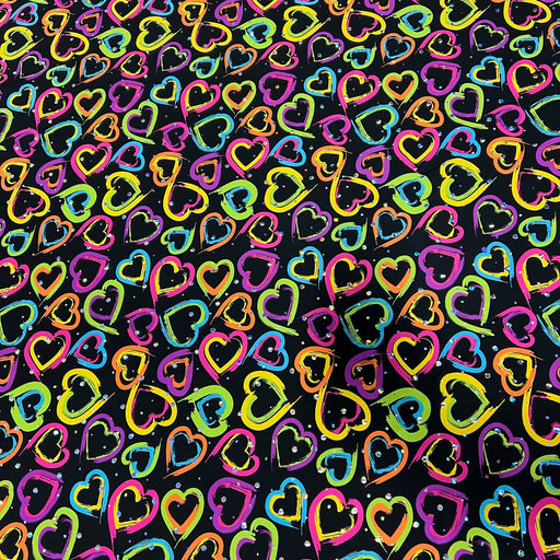 A seamless pattern of hand-drawn, colorful hearts in neon pink, yellow, blue, green, and orange on a black background.
