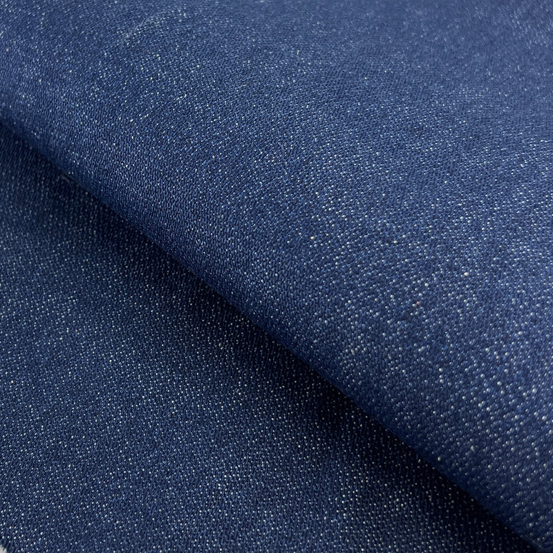 Close-up of dark blue fabric with a subtle texture