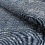 Close-up of textured blue denim fabric