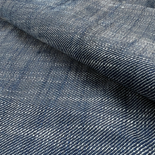 Close-up of textured blue denim fabric