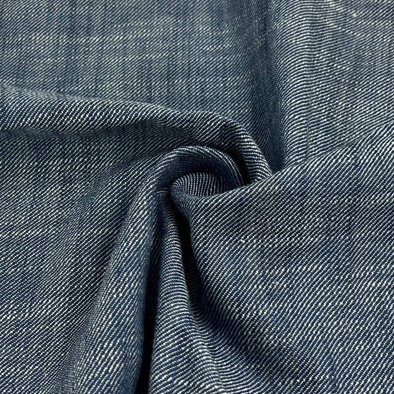 Close-up of blue denim fabric with visible texture