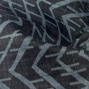 Closeup of lightweight tencel denim with geometric design print