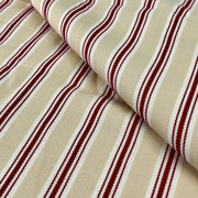 Close-up of beige fabric with red stripes