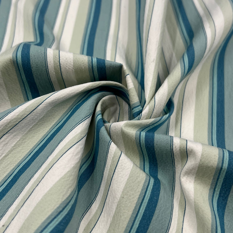Close-up of striped fabric with blue and beige pattern