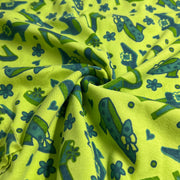 Green fabric with blue floral and leaf pattern