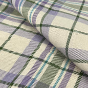 Plaid fabric with purple, green, and white pattern