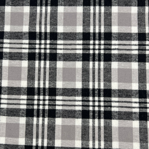 Lightweight cotton flannel shirting fabric featuring a tartan plaid design of black, white & taupe.