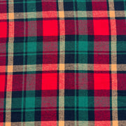 Lightweight flannel shirting fabric featuring a classic woven plaid design using christmas colors of green, red and gold. 