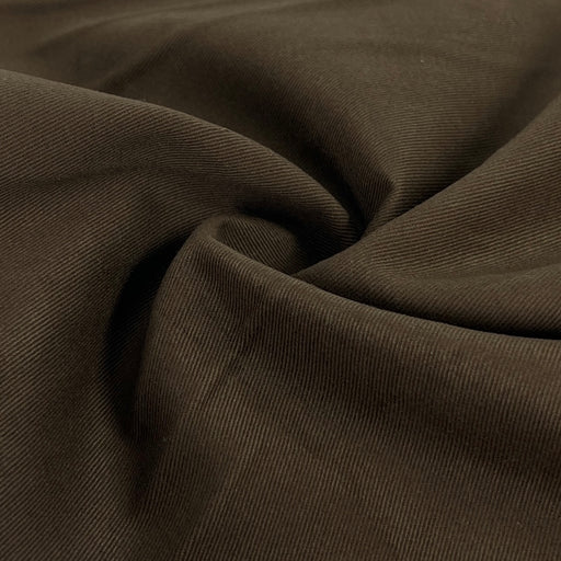 Close-up of dark brown fabric with visible texture